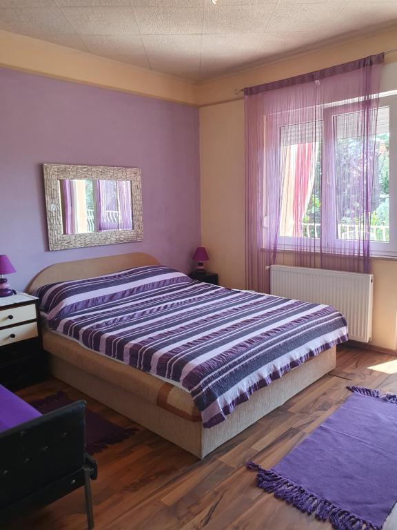 Postel nebo postele na pokoji v ubytování Senka