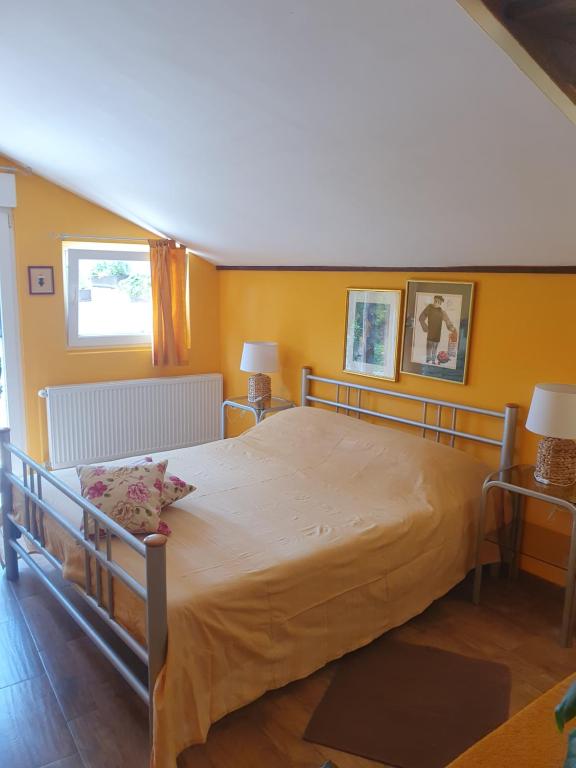 Postel nebo postele na pokoji v ubytování Senka