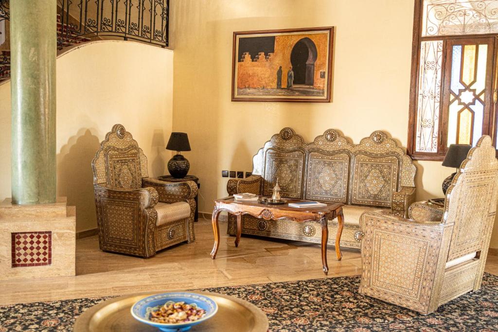 Posezení v ubytování Las Palmeras Guest House