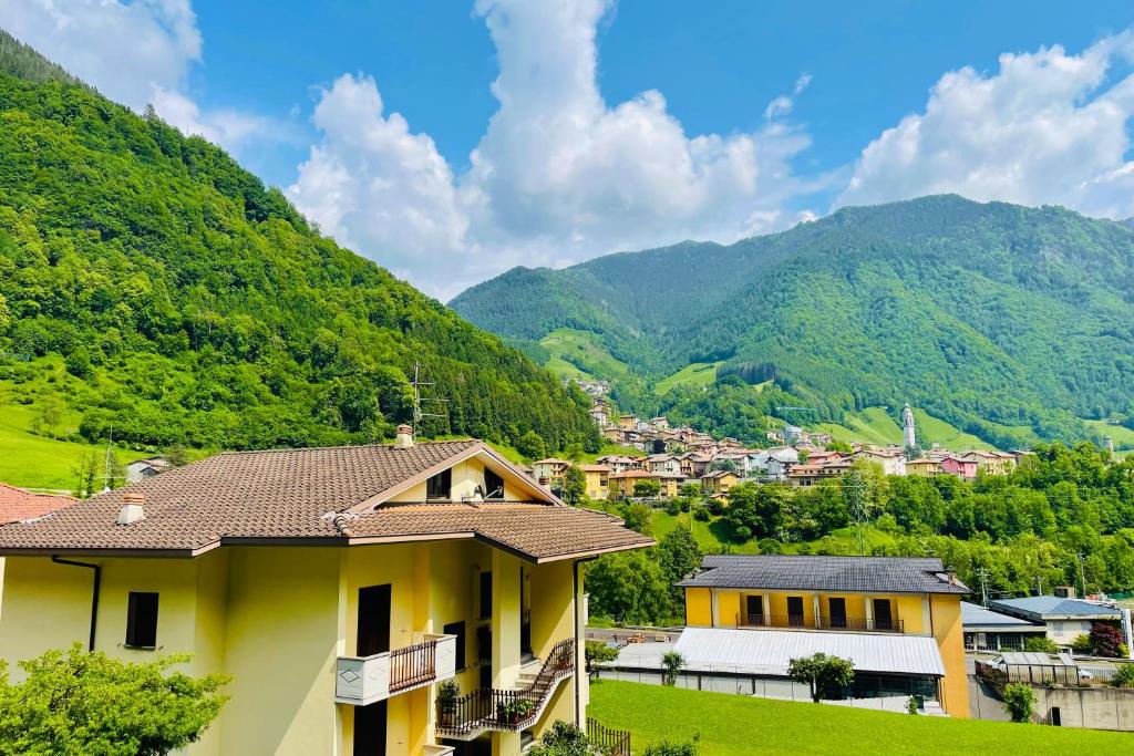 a house with a view of a mountain at La Dimora di Anna - tra le Vallate Alpine in Ardesio