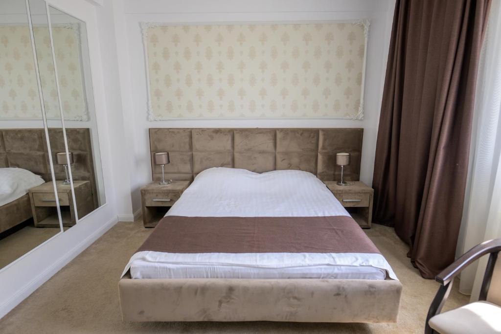 Postel nebo postele na pokoji v ubytování Hotel Maryiotis