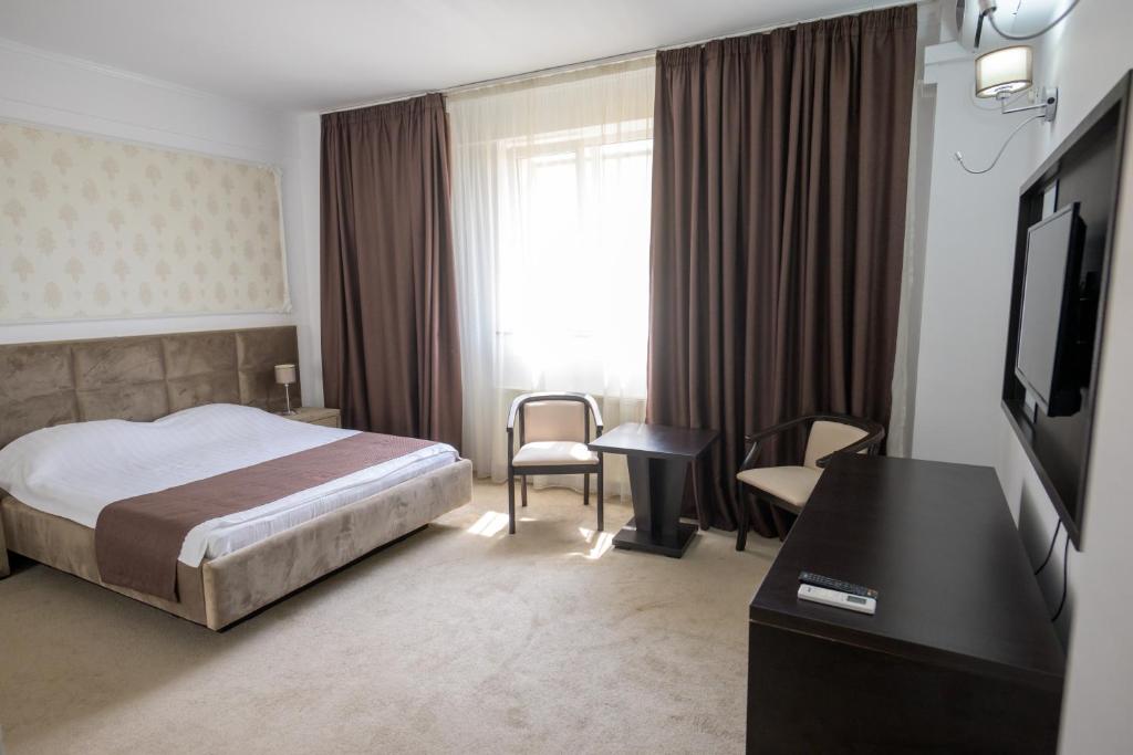 TV a/nebo společenská místnost v ubytování Hotel Maryiotis