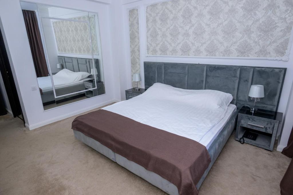 Postel nebo postele na pokoji v ubytování Hotel Maryiotis