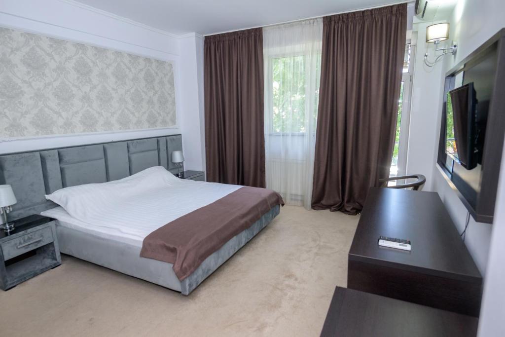 Postel nebo postele na pokoji v ubytování Hotel Maryiotis