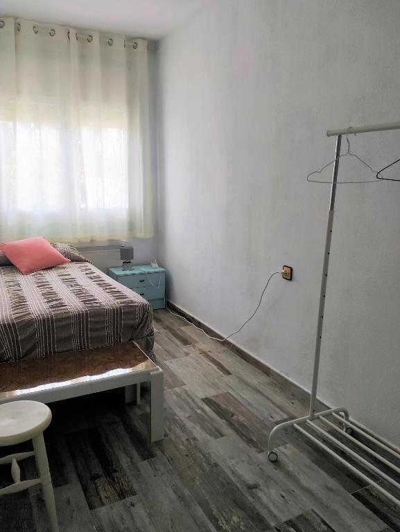 Postel nebo postele na pokoji v ubytování Apartament ca l'Irene