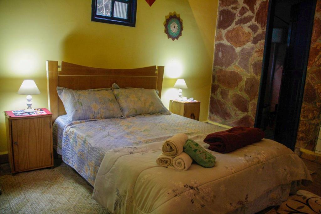 Postel nebo postele na pokoji v ubytování Espaço Vaidya Ayurveda Pousada