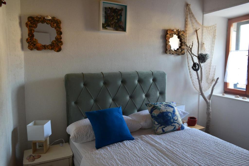 Postel nebo postele na pokoji v ubytování VILLA MOST Tisno