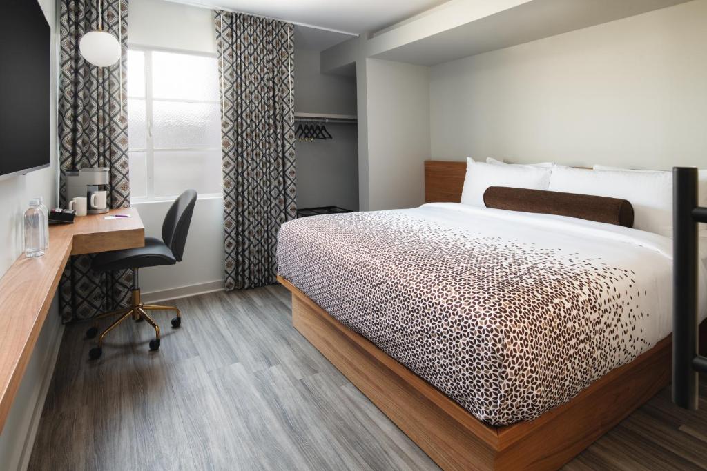 Postel nebo postele na pokoji v ubytování Hotel Keen