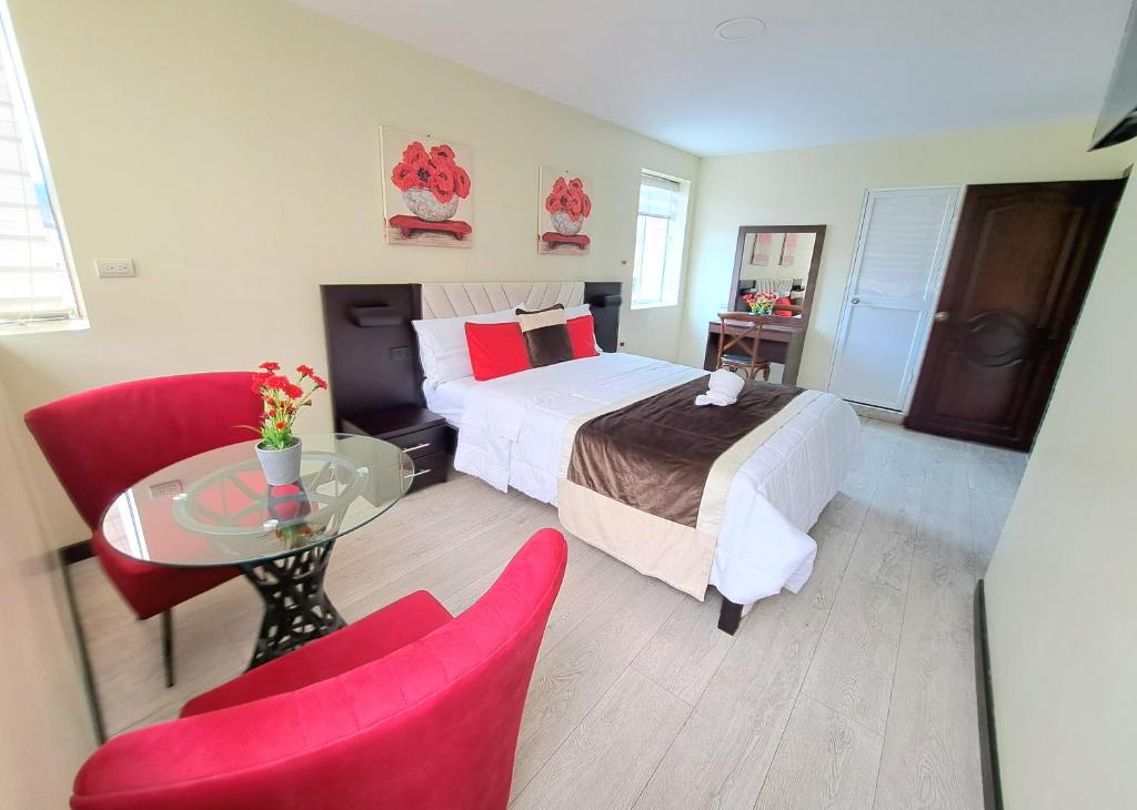 Postel nebo postele na pokoji v ubytování Hotel Loja Bella