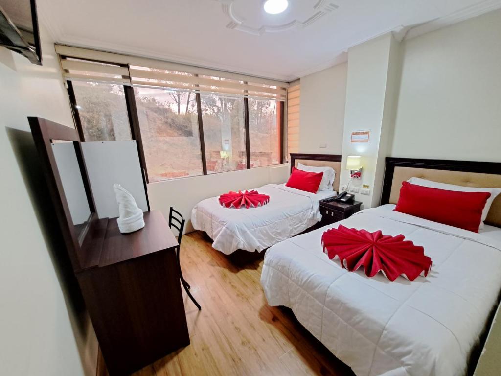 Postel nebo postele na pokoji v ubytování Hotel Loja Bella