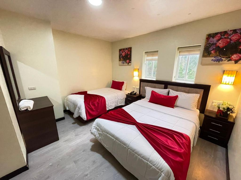 Postel nebo postele na pokoji v ubytování Hotel Loja Bella