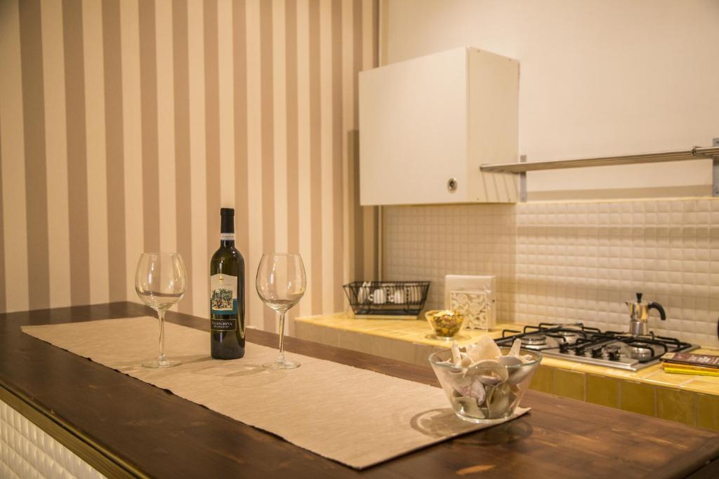 Nápoje v ubytovaní Piazza Roma Rooms
