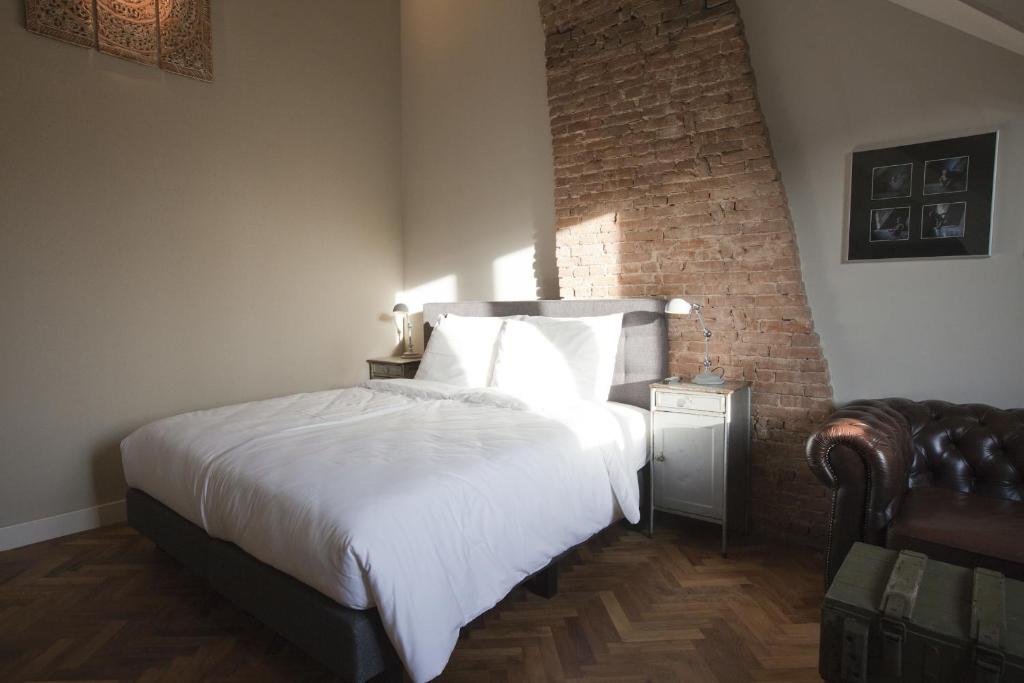 Postel nebo postele na pokoji v ubytování Hotel Sleep-Inn Box 5
