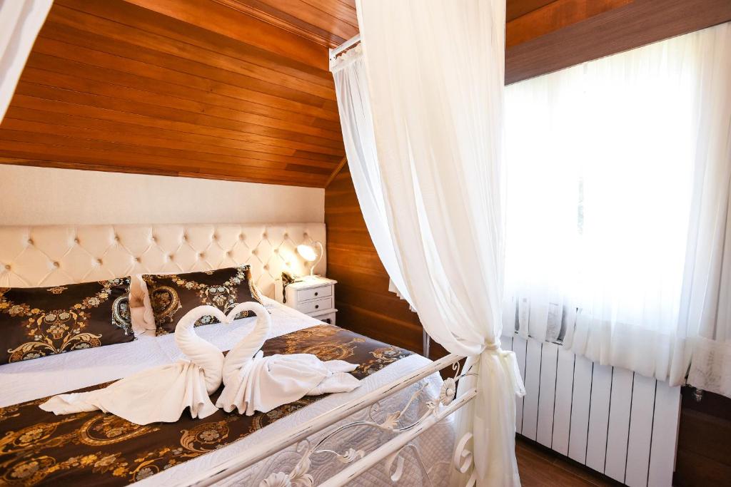 Postel nebo postele na pokoji v ubytování Hotel Kehl Haus