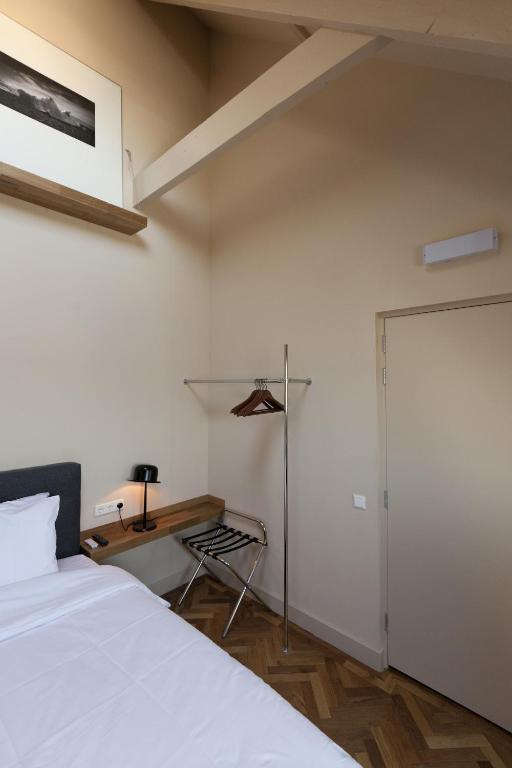 Postel nebo postele na pokoji v ubytování Hotel Sleep-Inn Box 5