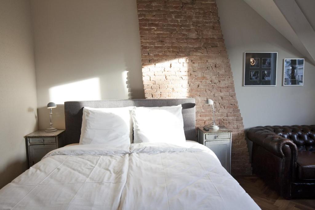 Postel nebo postele na pokoji v ubytování Hotel Sleep-Inn Box 5