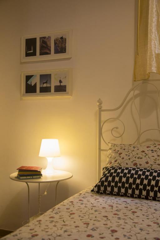 Posteľ alebo postele v izbe v ubytovaní Piazza Roma Rooms