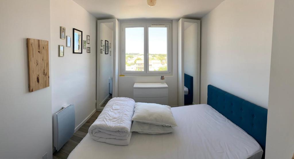 Postel nebo postele na pokoji v ubytování Appartement 2P à 1 min de la mer
