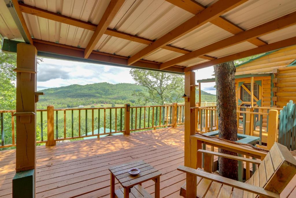 a deck with a view of the mountains at Secluded Mountain Cabin with Decks and Gazebo! in Brasstown