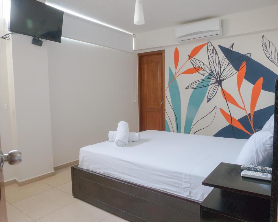 Postel nebo postele na pokoji v ubytování Margaritas Palace Hotel