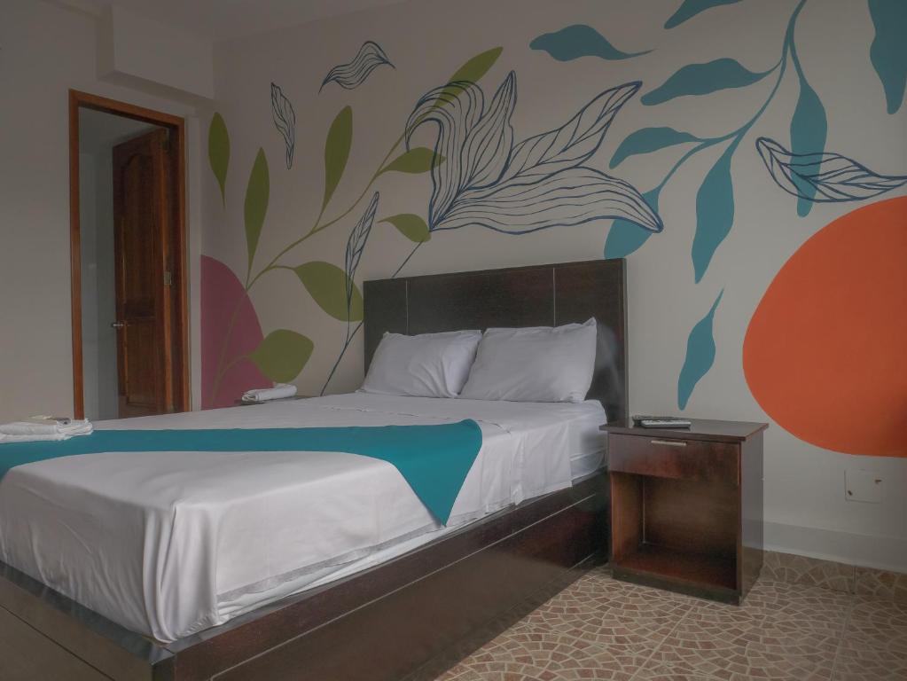 Postel nebo postele na pokoji v ubytování Margaritas Palace Hotel