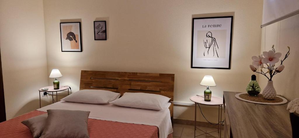 A bed or beds in a room at Grace dell'isola dei Coralli