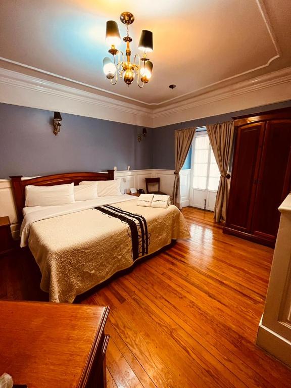 Postel nebo postele na pokoji v ubytování Hotel Real Del Monte