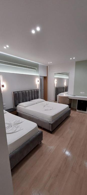 Postel nebo postele na pokoji v ubytování HOTEL KRISTAL