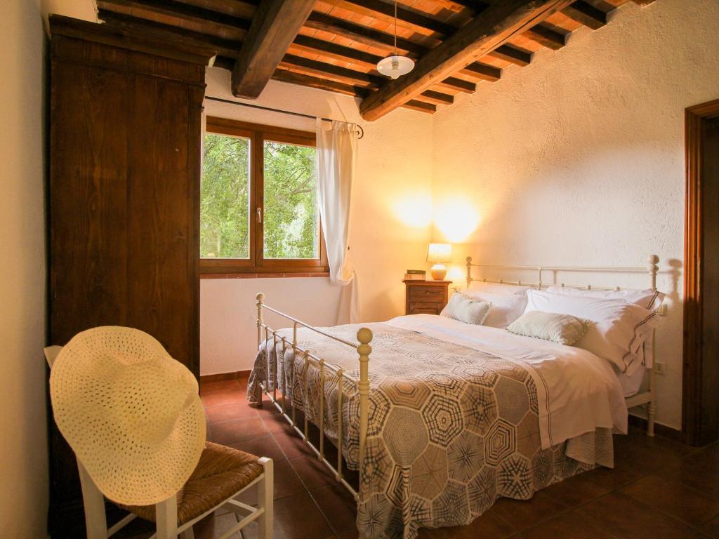 Postel nebo postele na pokoji v ubytování Agriturismo Boschi di Montecalvi