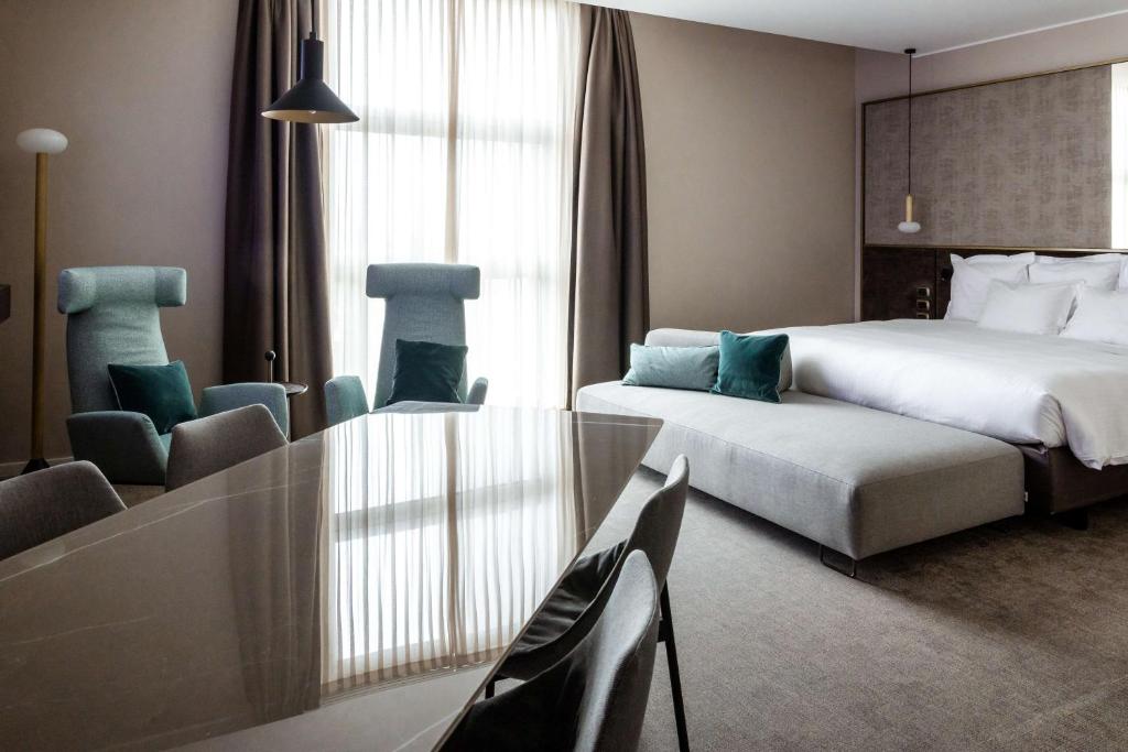 Postel nebo postele na pokoji v ubytování Best Western Premier BHR Treviso Hotel