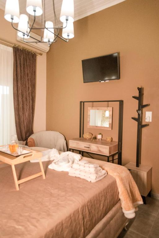 A bed or beds in a room at The 50/50 Luxury Apartments