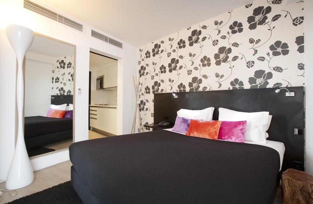 Postelja oz. postelje v sobi nastanitve Funchal Design Hotel