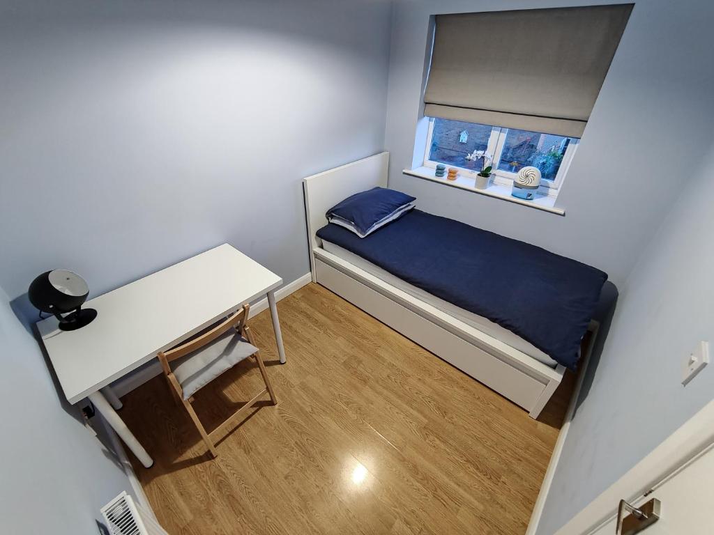 Postel nebo postele na pokoji v ubytování Joshua Court Single Room