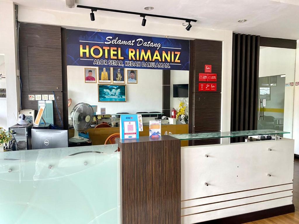 a hotel rimini restaurant with a glass counter top at Rimaniz Hotel Alor Setar in Alor Setar