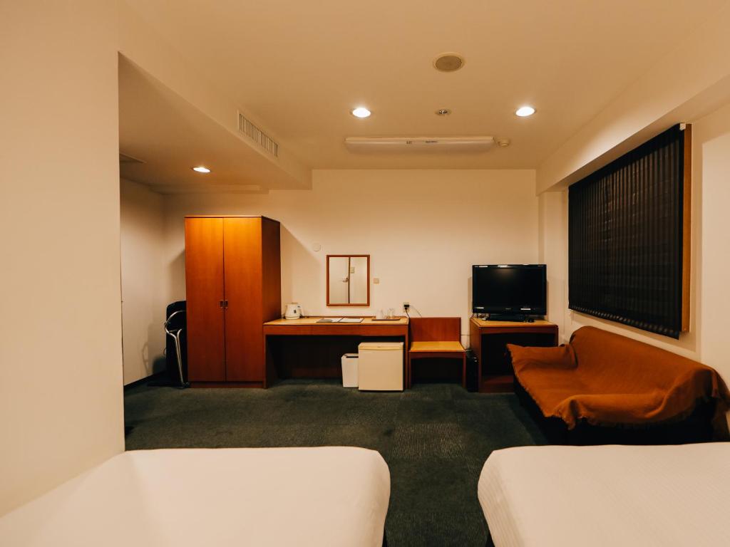 TV a/nebo společenská místnost v ubytování 3s HOTEL HIRATSUKA