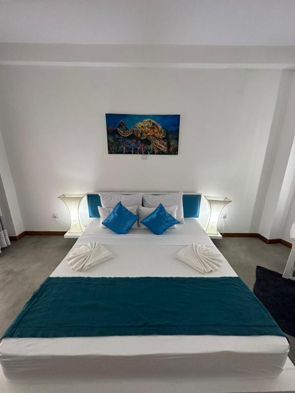 Katil atau katil-katil dalam bilik di Sunset Sands
