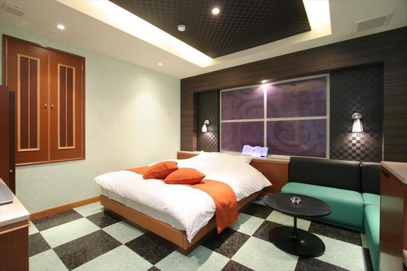 Postel nebo postele na pokoji v ubytování HOTEL TEX