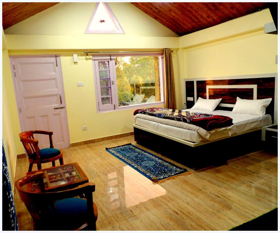 Postel nebo postele na pokoji v ubytování THE HIDEAWAY Homestay Chail