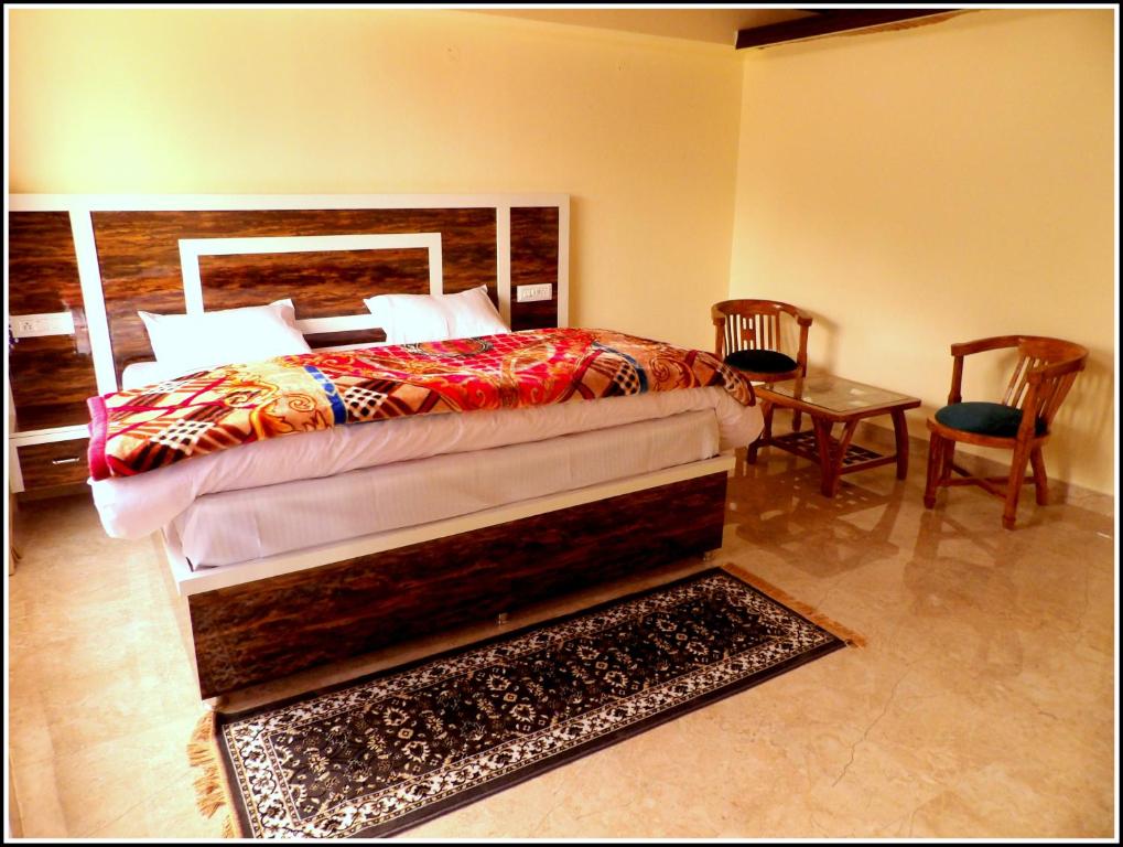 Postel nebo postele na pokoji v ubytování THE HIDEAWAY Homestay Chail