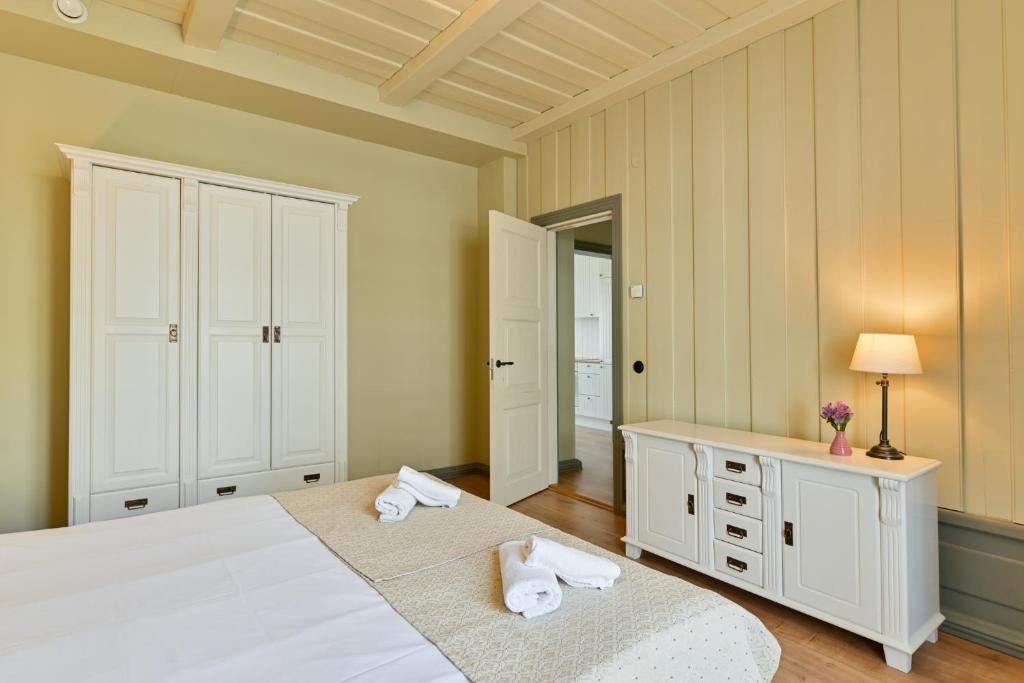 Postel nebo postele na pokoji v ubytování Pargimaja Apartments
