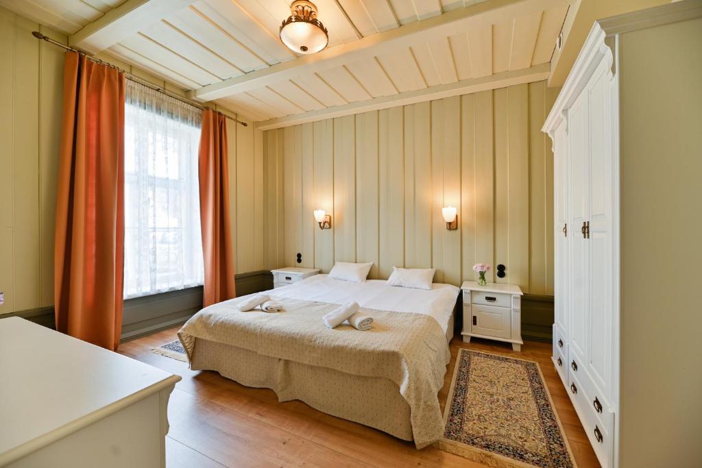 Postel nebo postele na pokoji v ubytování Pargimaja Apartments