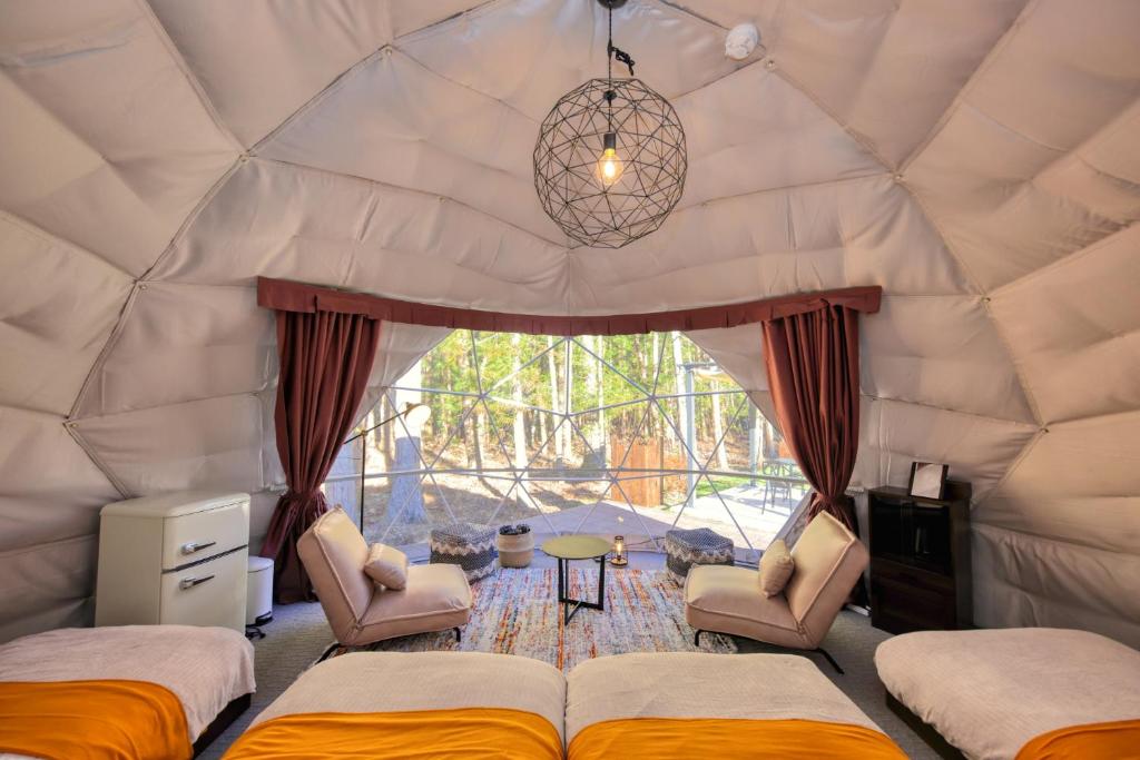 Letto o letti in una camera di HOSHIFULL DOME FUJI