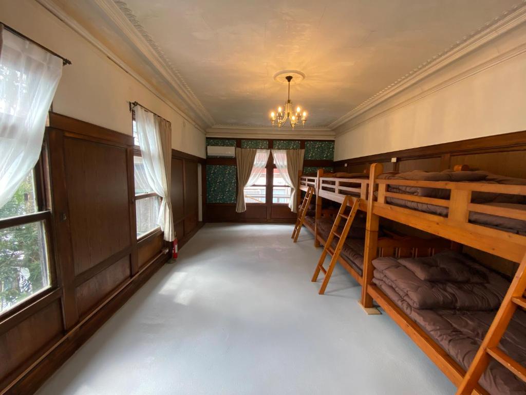 Postel nebo postele na pokoji v ubytování anakashico Hostel Kumano Kodo