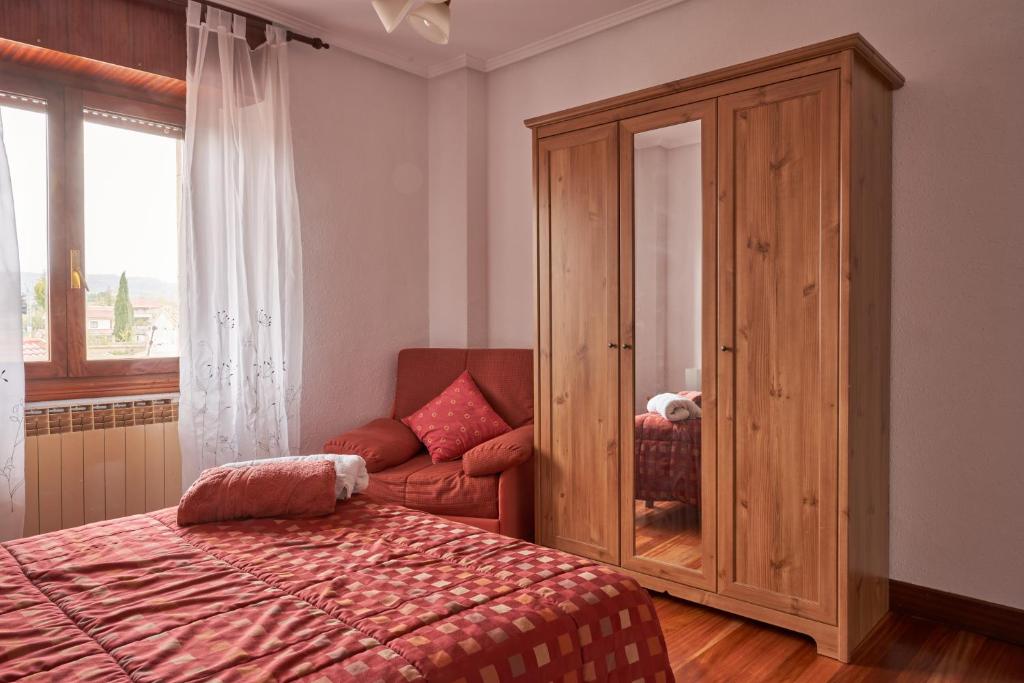Postel nebo postele na pokoji v ubytování Chez Pitu