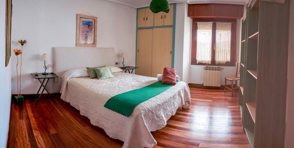 Postel nebo postele na pokoji v ubytování Chez Pitu