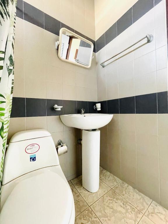 Koupelna v ubytování Meewaya Hotel