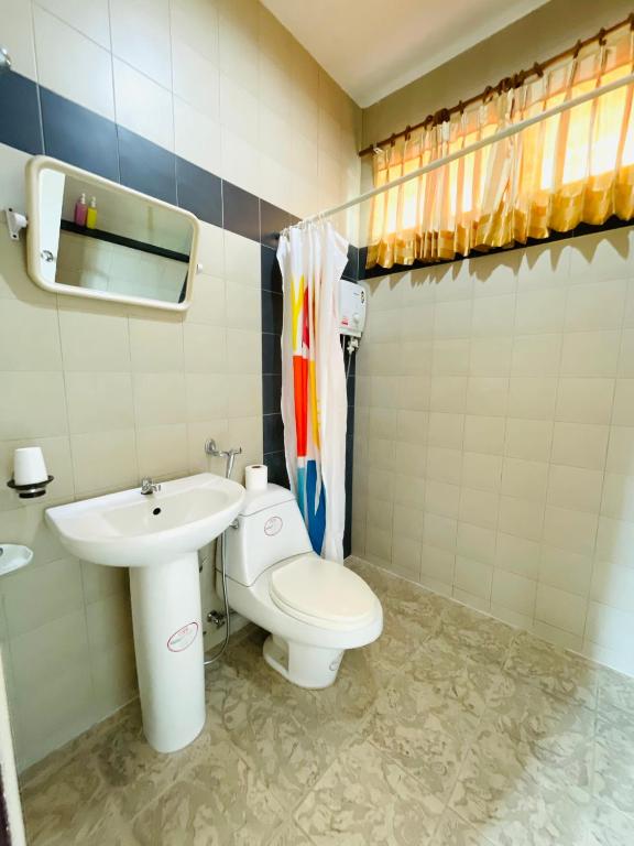 Koupelna v ubytování Meewaya Hotel
