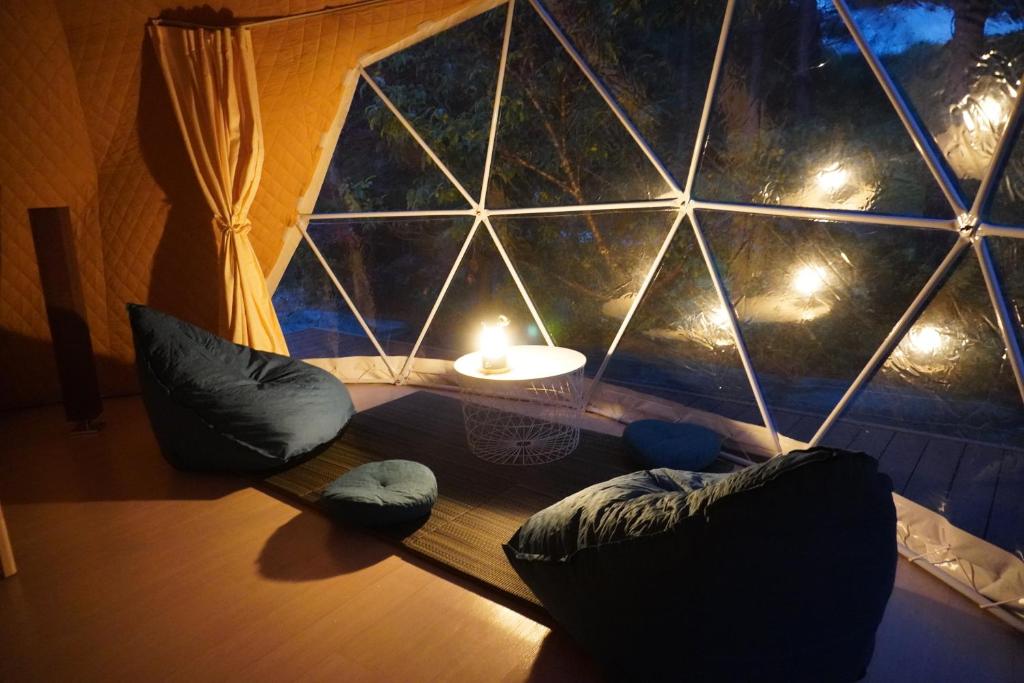 Posezení v ubytování glampark Gekkabijin Nagano