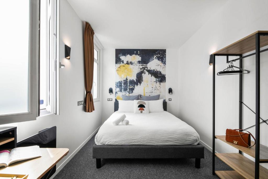 Postel nebo postele na pokoji v ubytování Urban Style Biarritz Le Relais