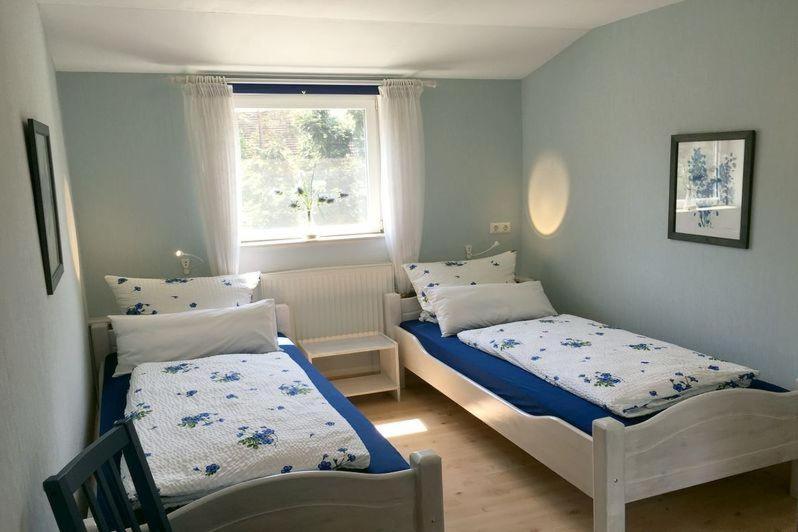 Postel nebo postele na pokoji v ubytování Haus 52° Nord, Ferienwohnung
